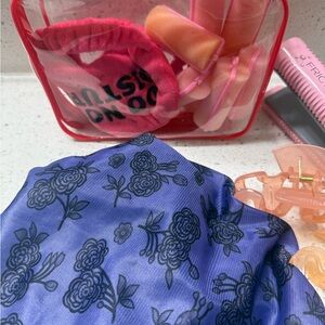 Hair kit comp with Floral purple hat, straightened, clips, eyes mask and rollers